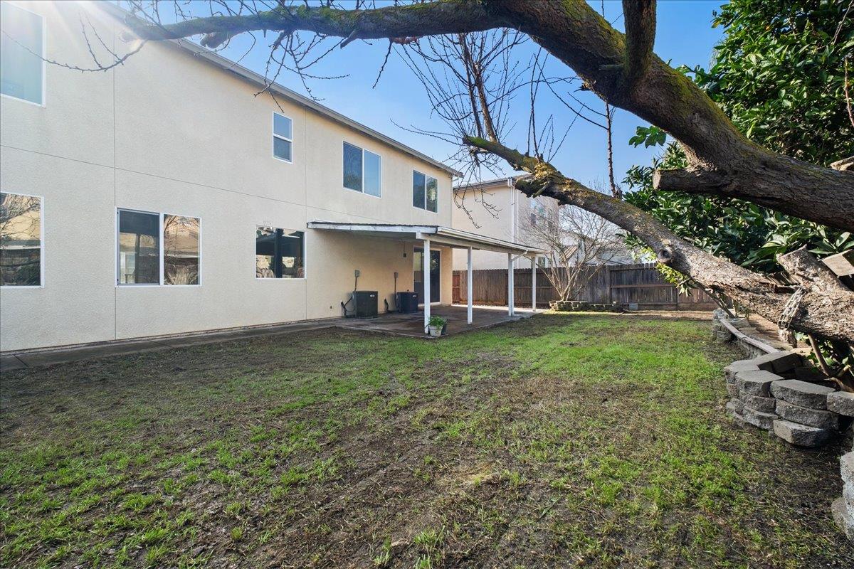 2413 Ventana View Way Modesto, CA 95355 - Photo 47 of 51 a view of a house with backyard and garden