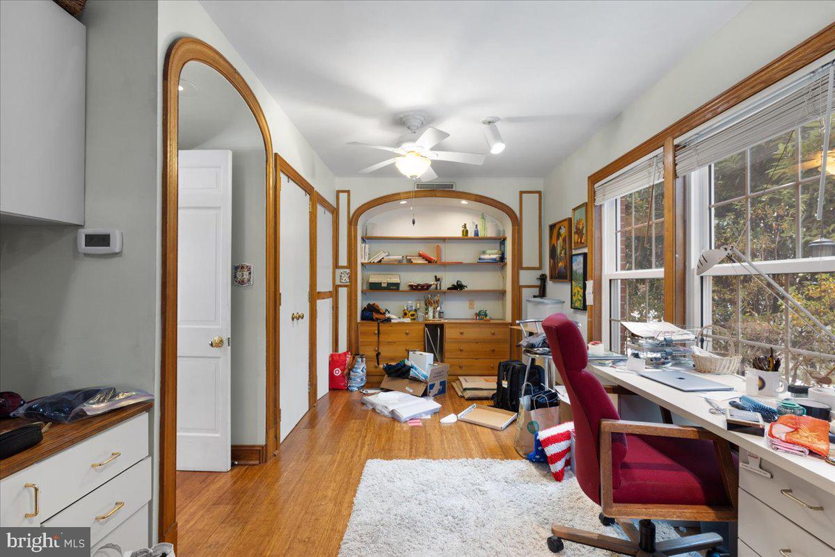130 Hilltop Road Silver Spring, MD 20910 - Photo 23 of 48 a very nice looking room with a large window and chairs