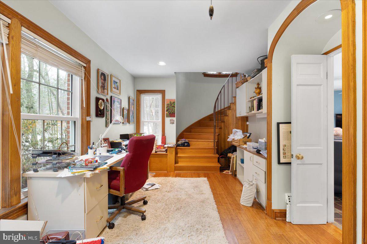 130 Hilltop Road Silver Spring, MD 20910 - Photo 24 of 48 a view of a livingroom with furniture staircase and windows