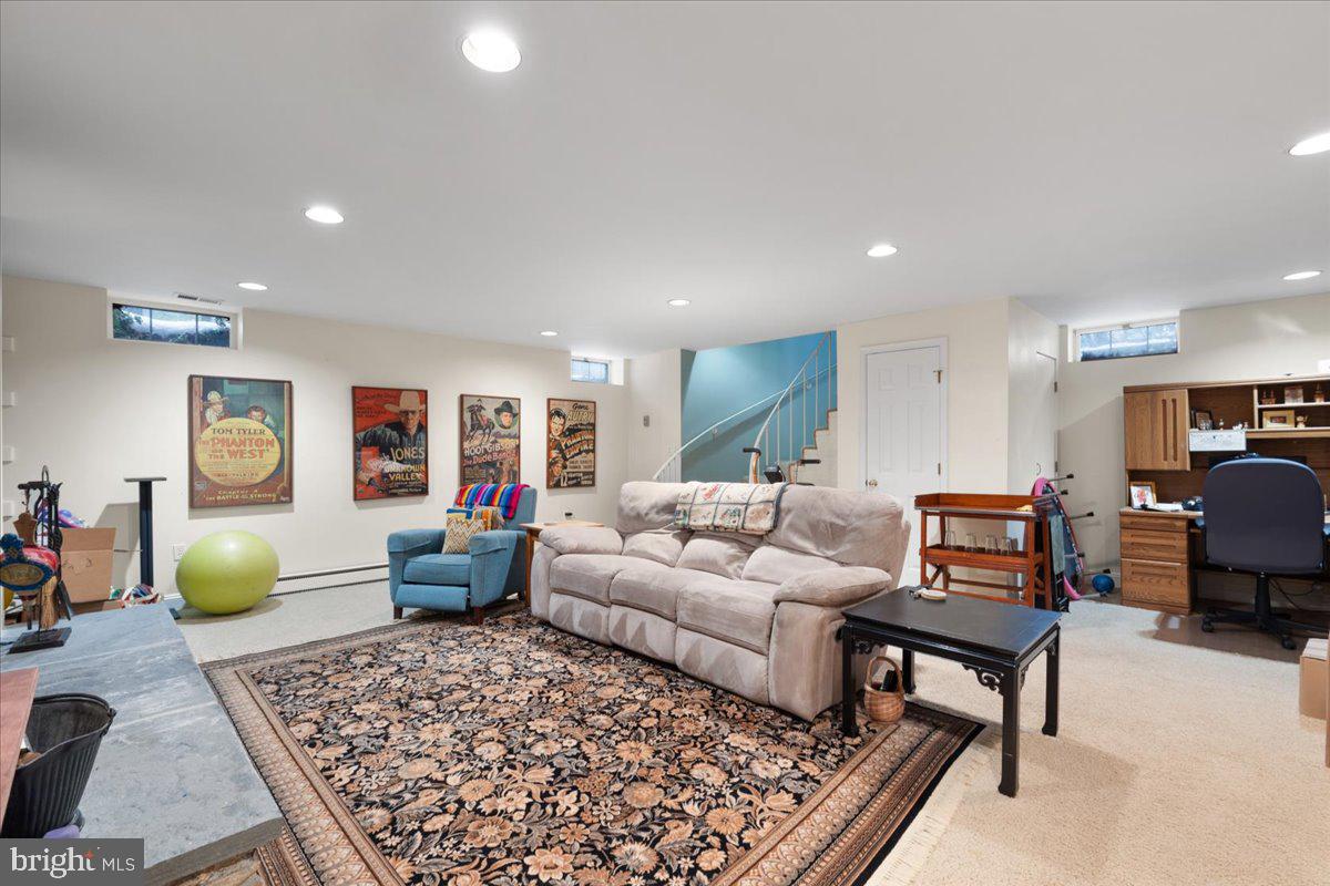 130 Hilltop Road Silver Spring, MD 20910 - Photo 42 of 48 a living room with furniture and a wooden floor