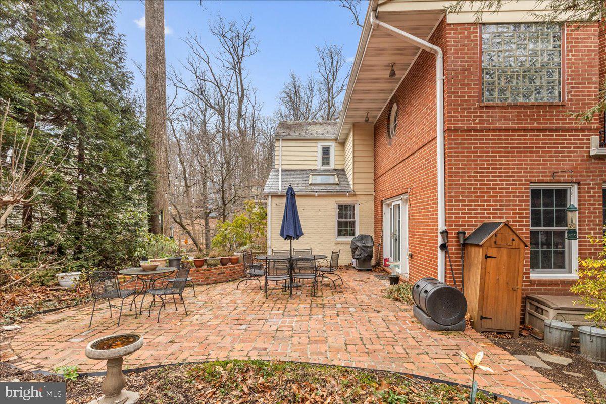 130 Hilltop Road Silver Spring, MD 20910 - Photo 46 of 48 a backyard of a house with outdoor seating