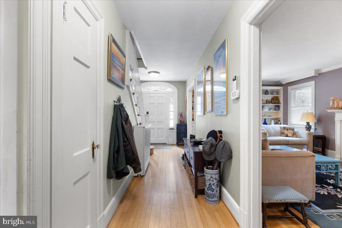 130 Hilltop Road Silver Spring, MD 20910 - Photo 9 of 48 a view of a hallway with furniture and wooden floor