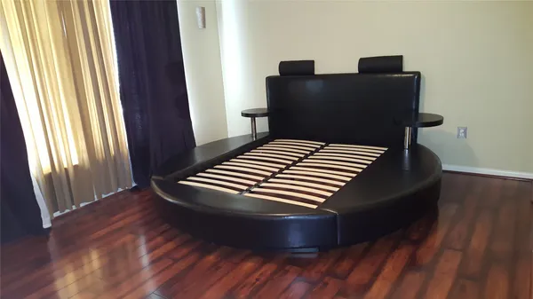 a balcony with wooden floor