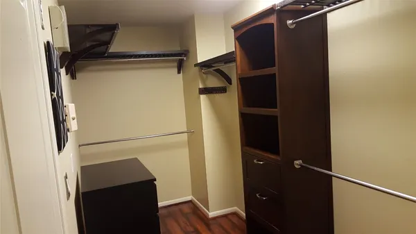 a view of a door and an empty room