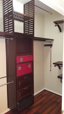 a view of a door and an empty room