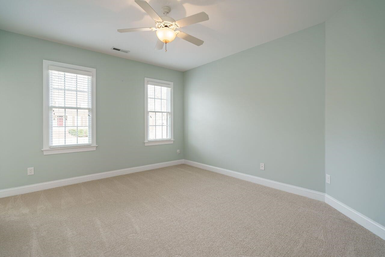5327 Landguard Drive Raleigh, NC 27613 - Photo 31 of 45 Light filled bedroom with en suite bathroom. Bedroom