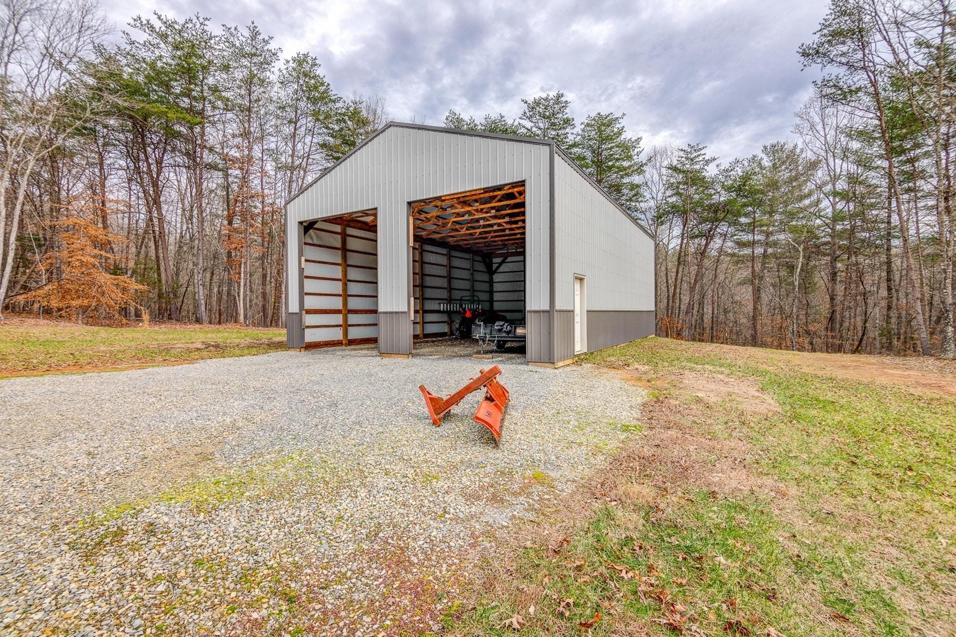 565 Charlie Road Hardy, VA 24101 - Photo 15 of 58 a front view of a house with a yard
