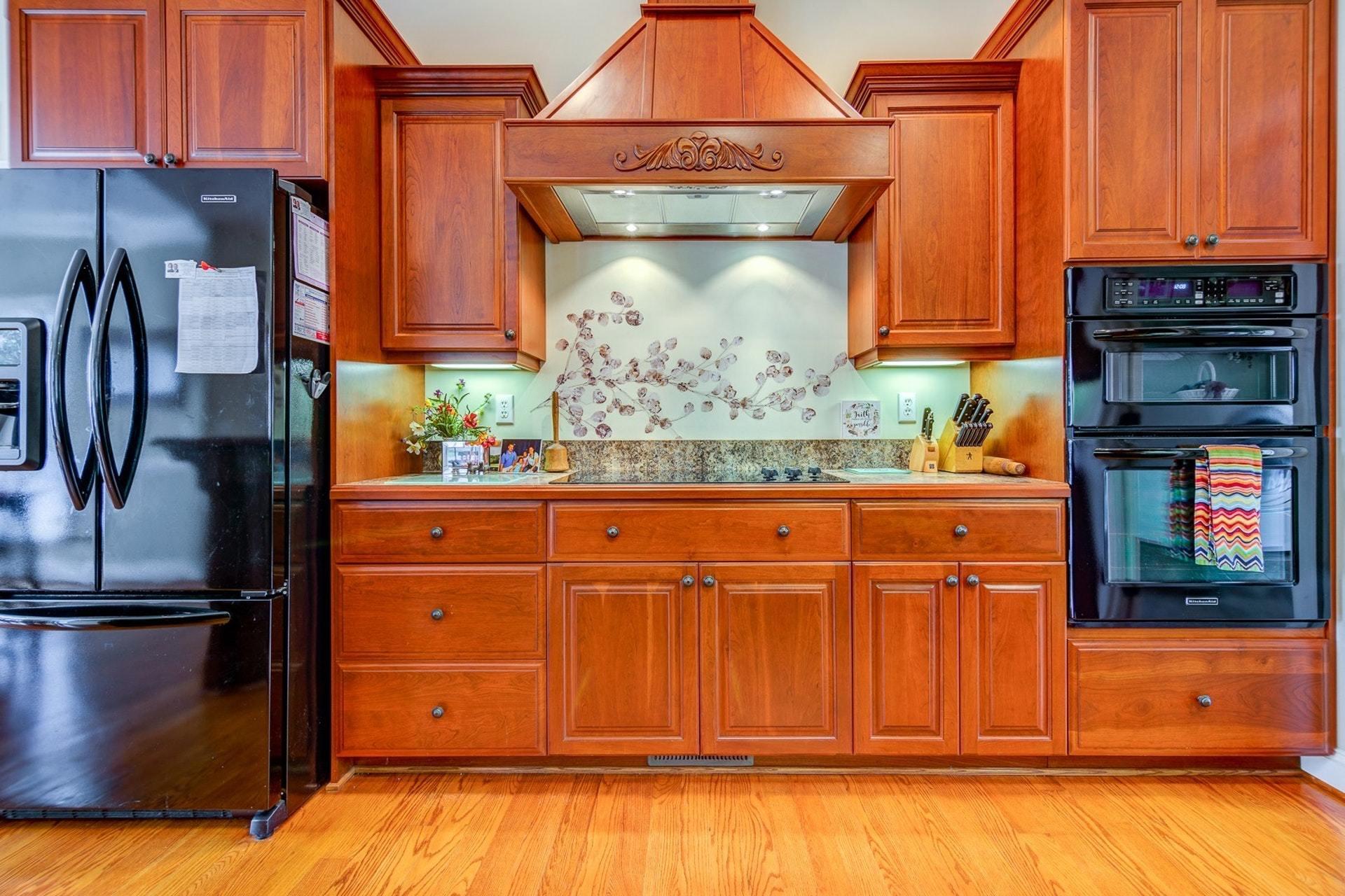 565 Charlie Road Hardy, VA 24101 - Photo 22 of 58 a kitchen with stainless steel appliances granite countertop a refrigerator and a stove top oven