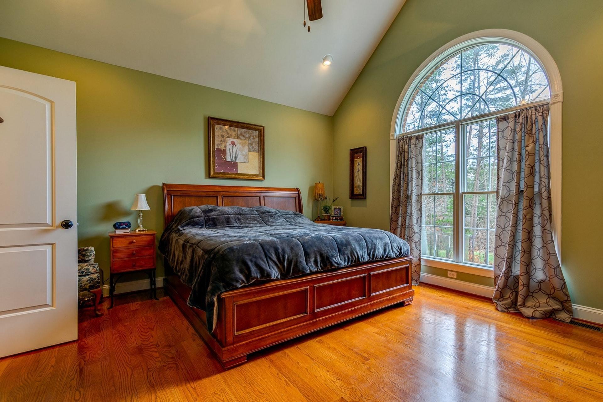 565 Charlie Road Hardy, VA 24101 - Photo 24 of 58 a bedroom with a bed and window