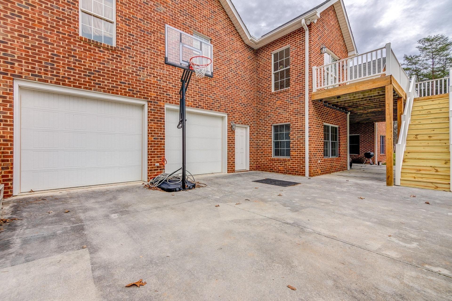 565 Charlie Road Hardy, VA 24101 - Photo 35 of 58 a view of a house with basketball court