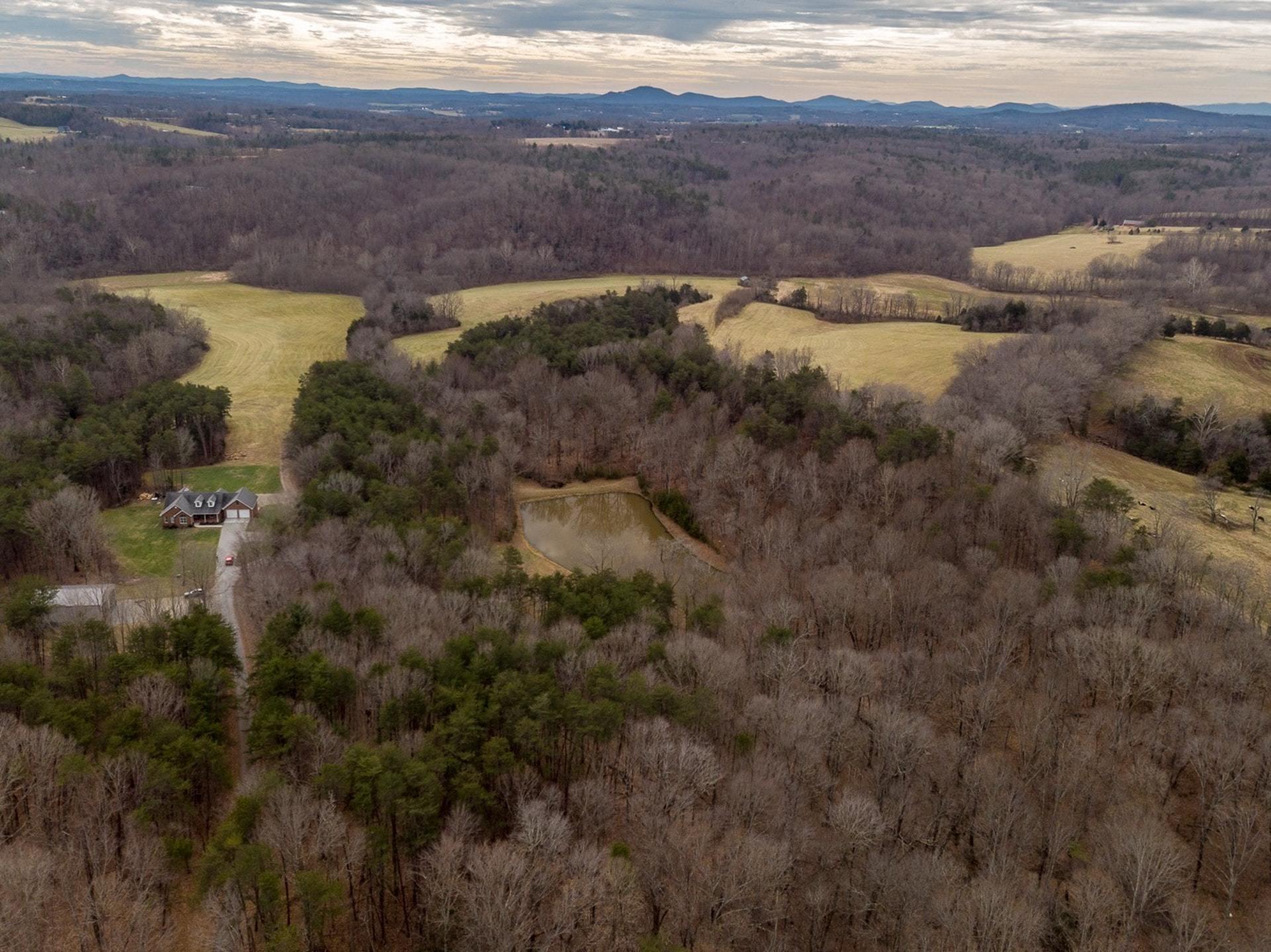 565 Charlie Road Hardy, VA 24101 - Photo 44 of 58 a view of a lake with mountains in the background