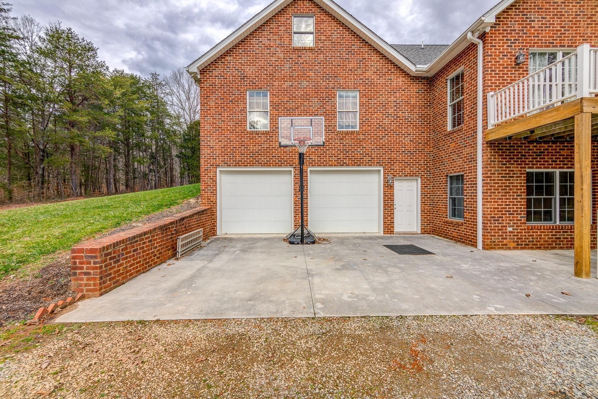565 Charlie Road Hardy, VA 24101 - Photo 54 of 58 a front view of a house with garden