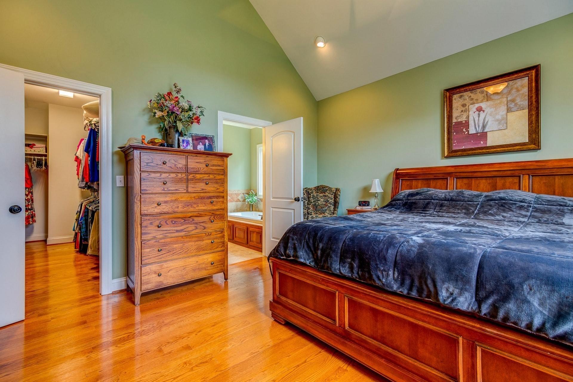 565 Charlie Road Hardy, VA 24101 - Photo 7 of 58 a bedroom with a bed and a view of walk in closet