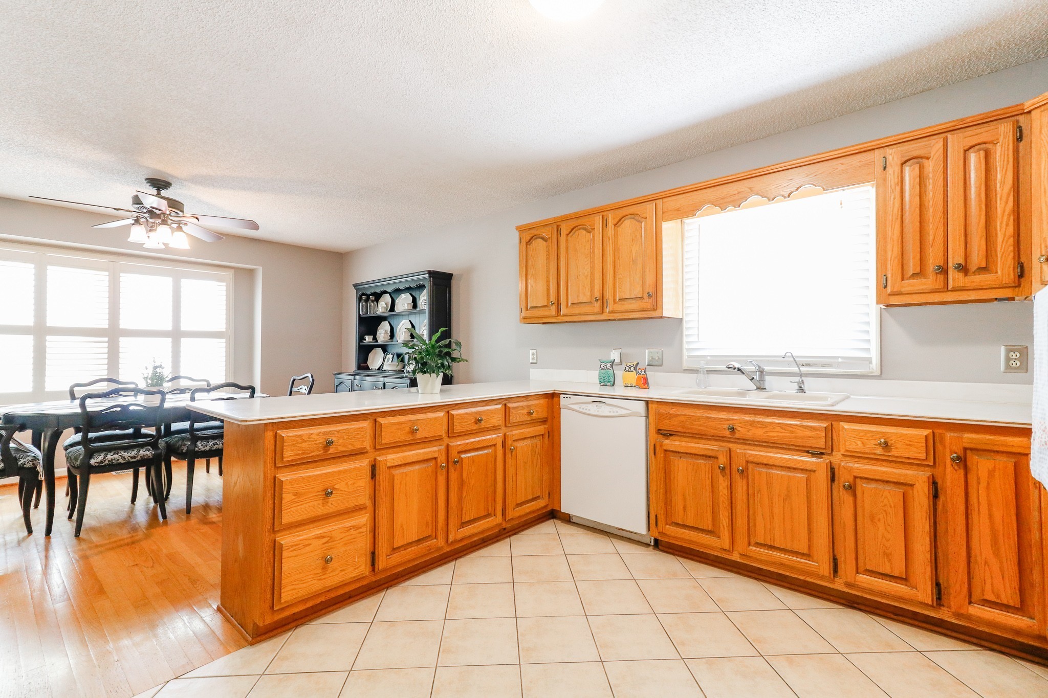 9801 Central Pike Mount Juliet, TN 37122 - Photo 12 of 42 a large kitchen with granite countertop a large counter top space windows and stainless steel appliances