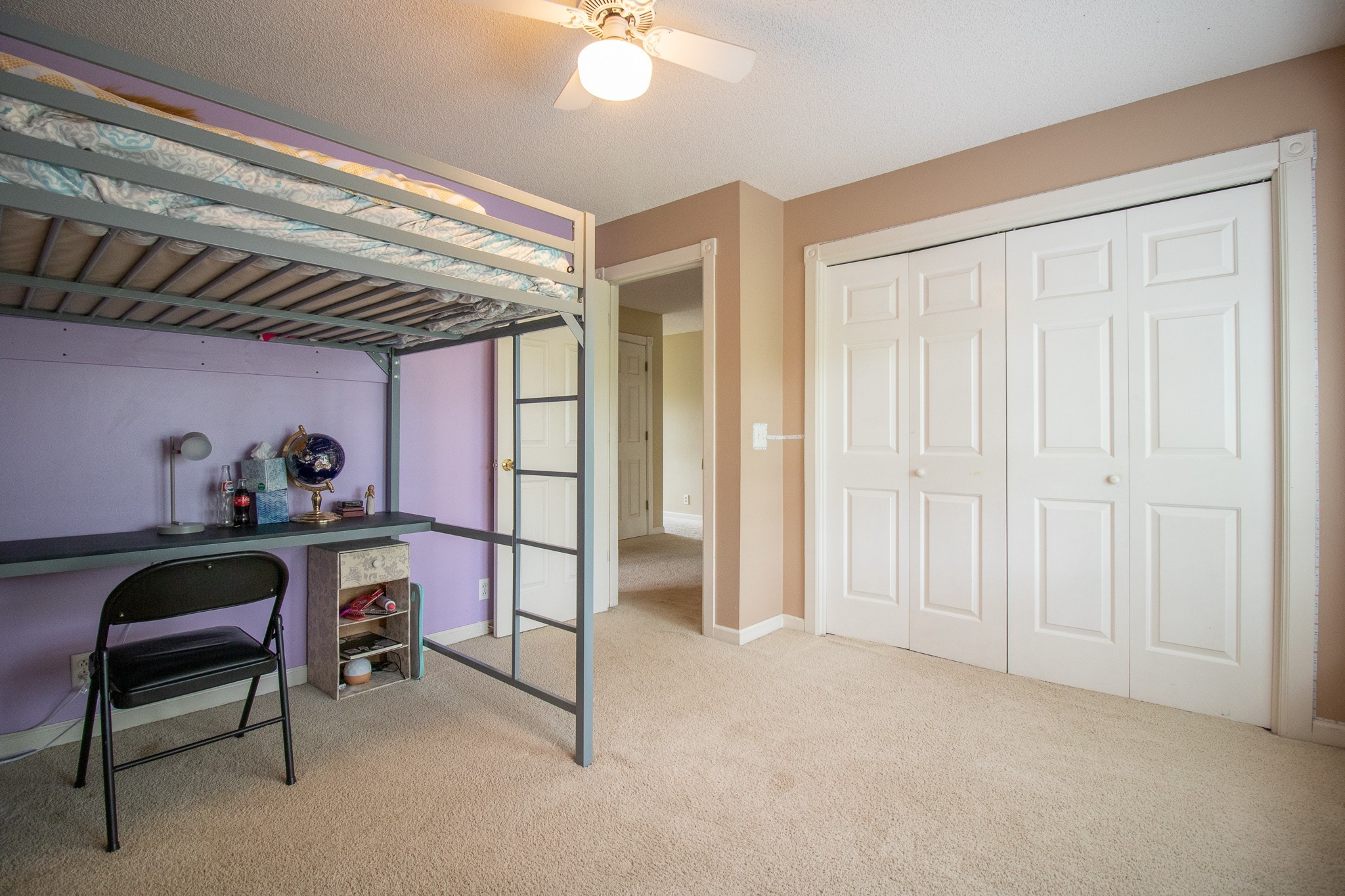 9801 Central Pike Mount Juliet, TN 37122 - Photo 16 of 42 a bedroom with a bed and a chandelier