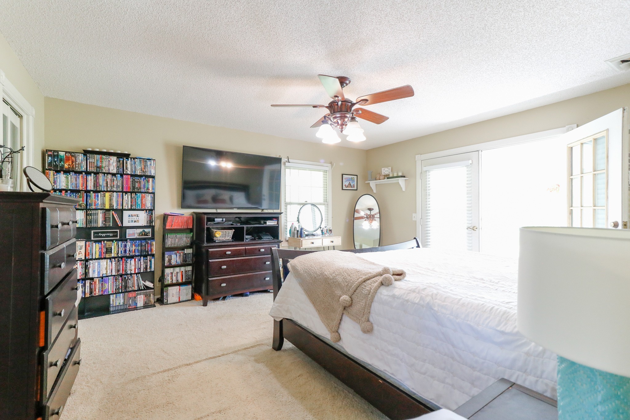 9801 Central Pike Mount Juliet, TN 37122 - Photo 17 of 42 a bedroom with a bed furniture and a flat tv screen