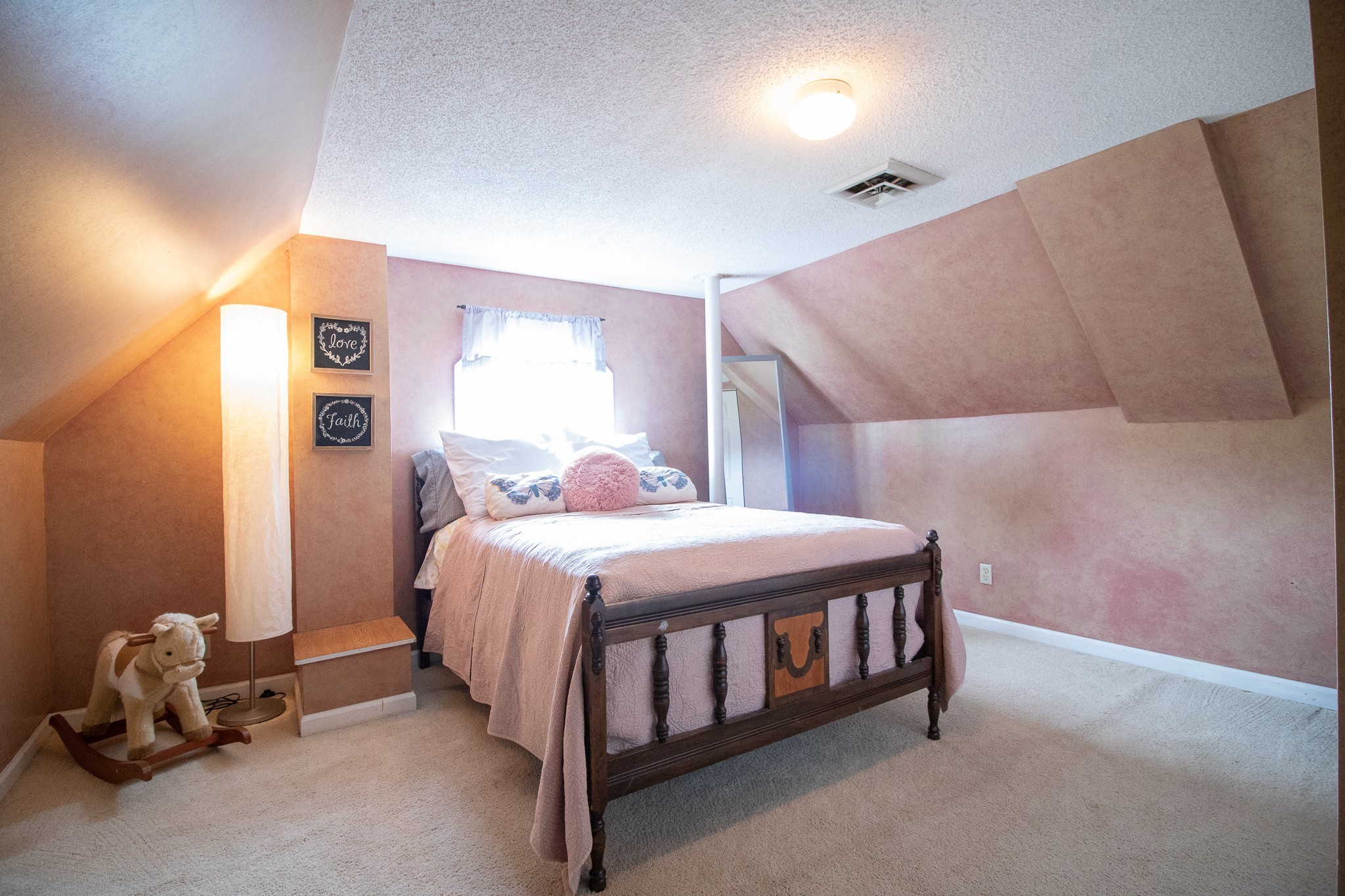 9801 Central Pike Mount Juliet, TN 37122 - Photo 23 of 42 a bedroom with a bed and a chair