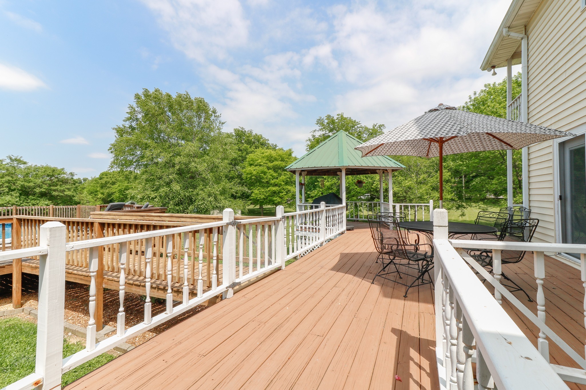 9801 Central Pike Mount Juliet, TN 37122 - Photo 29 of 42 a view of balcony with wooden floor and outdoor seating