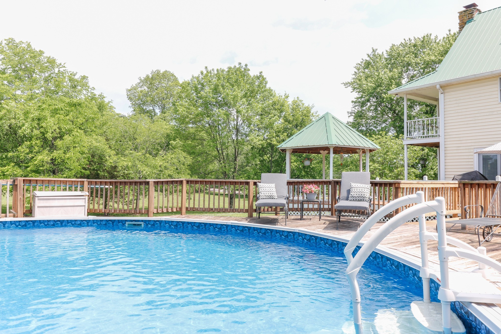 9801 Central Pike Mount Juliet, TN 37122 - Photo 30 of 42 a view of a house with wooden deck and furniture