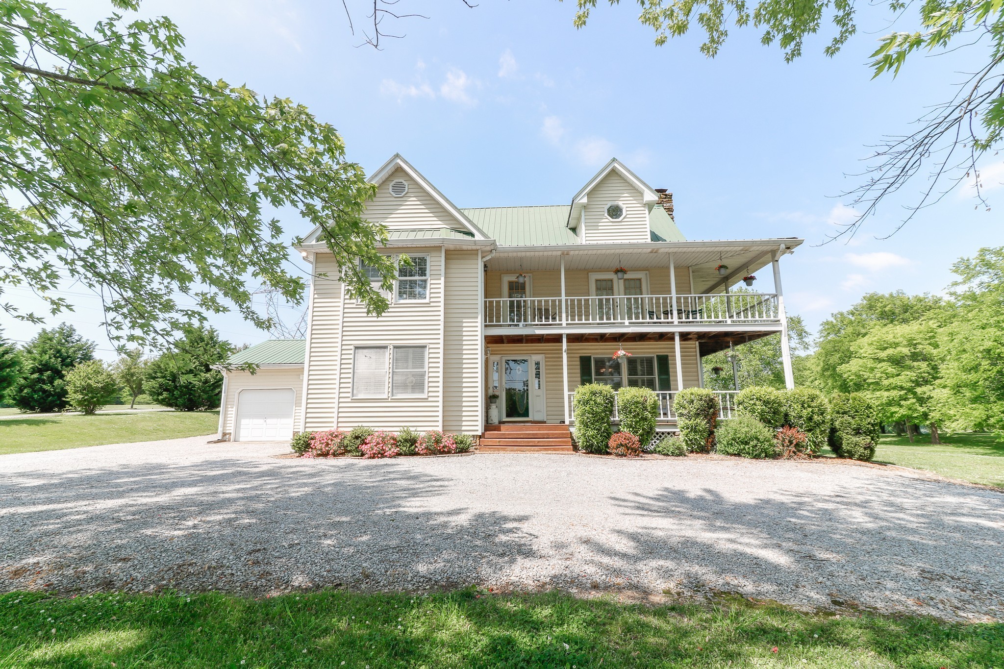9801 Central Pike Mount Juliet, TN 37122 - Photo 3 of 42 a front view of a house with a garden