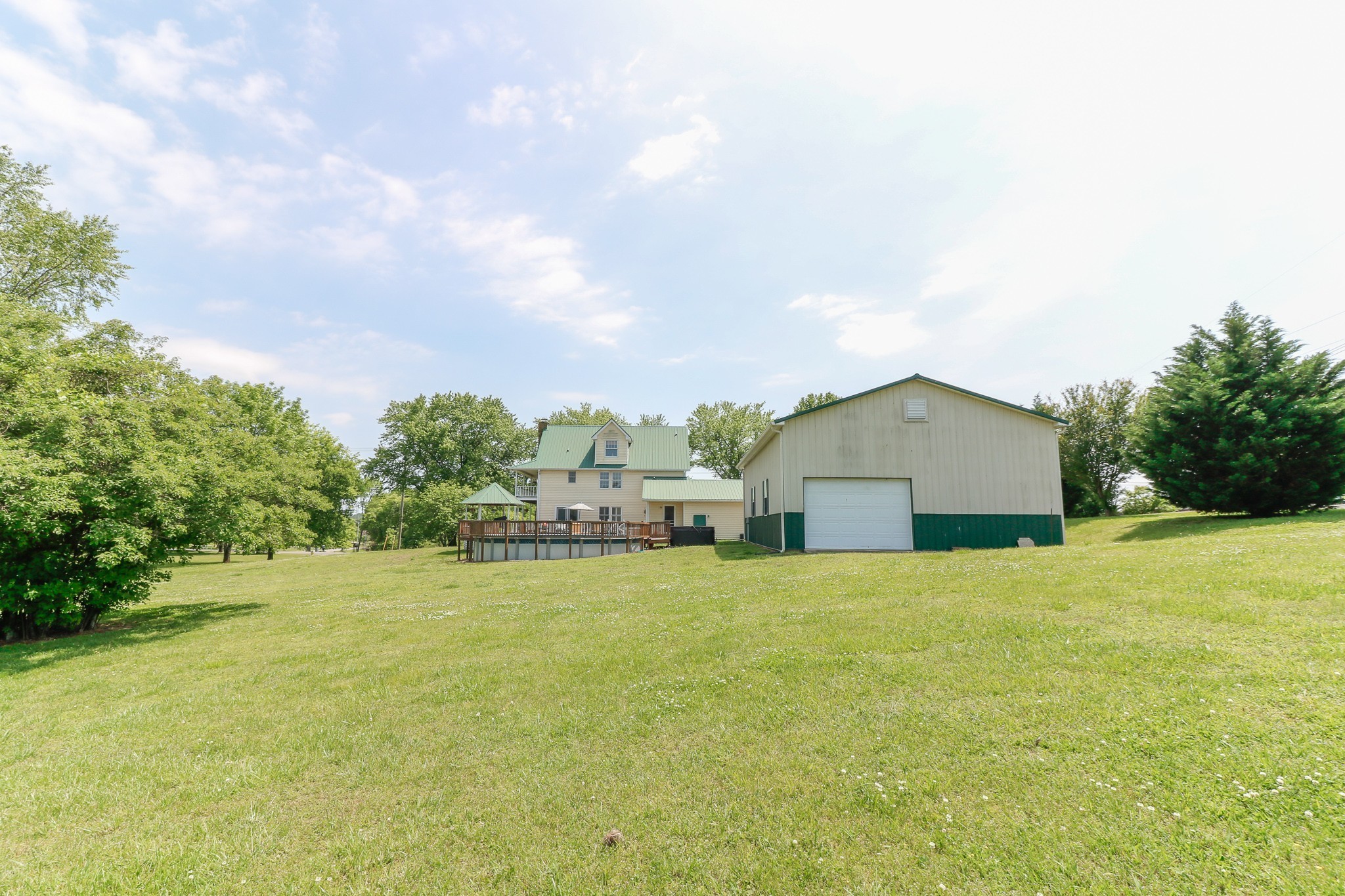 9801 Central Pike Mount Juliet, TN 37122 - Photo 33 of 42 a view of a house with a yard and garage