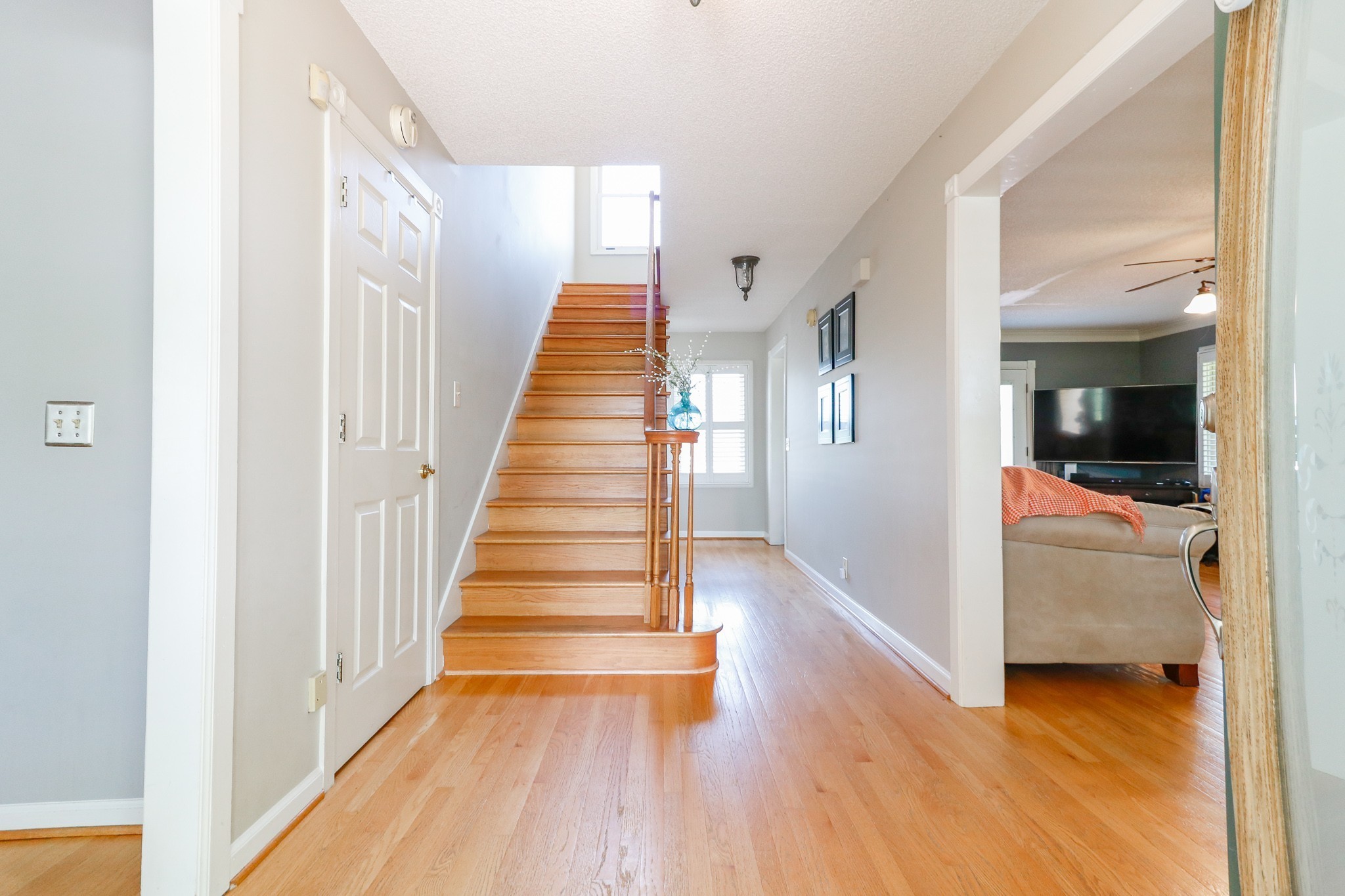 9801 Central Pike Mount Juliet, TN 37122 - Photo 7 of 42 a view of a hallway view with wooden floor and staircase