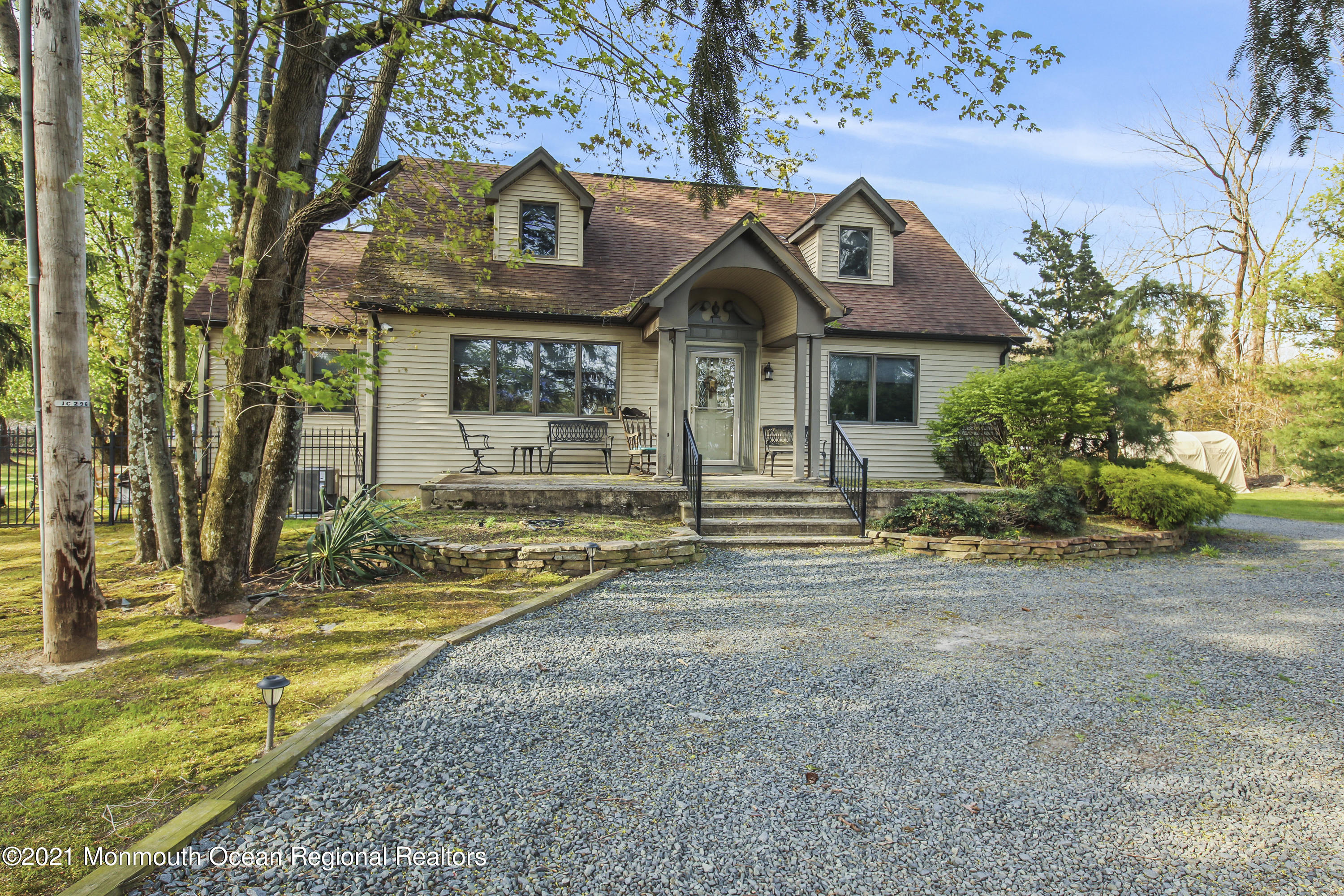 450 North County Line Road Jackson, NJ 08527 - Photo 2 of 35 a front view of a house with a yard