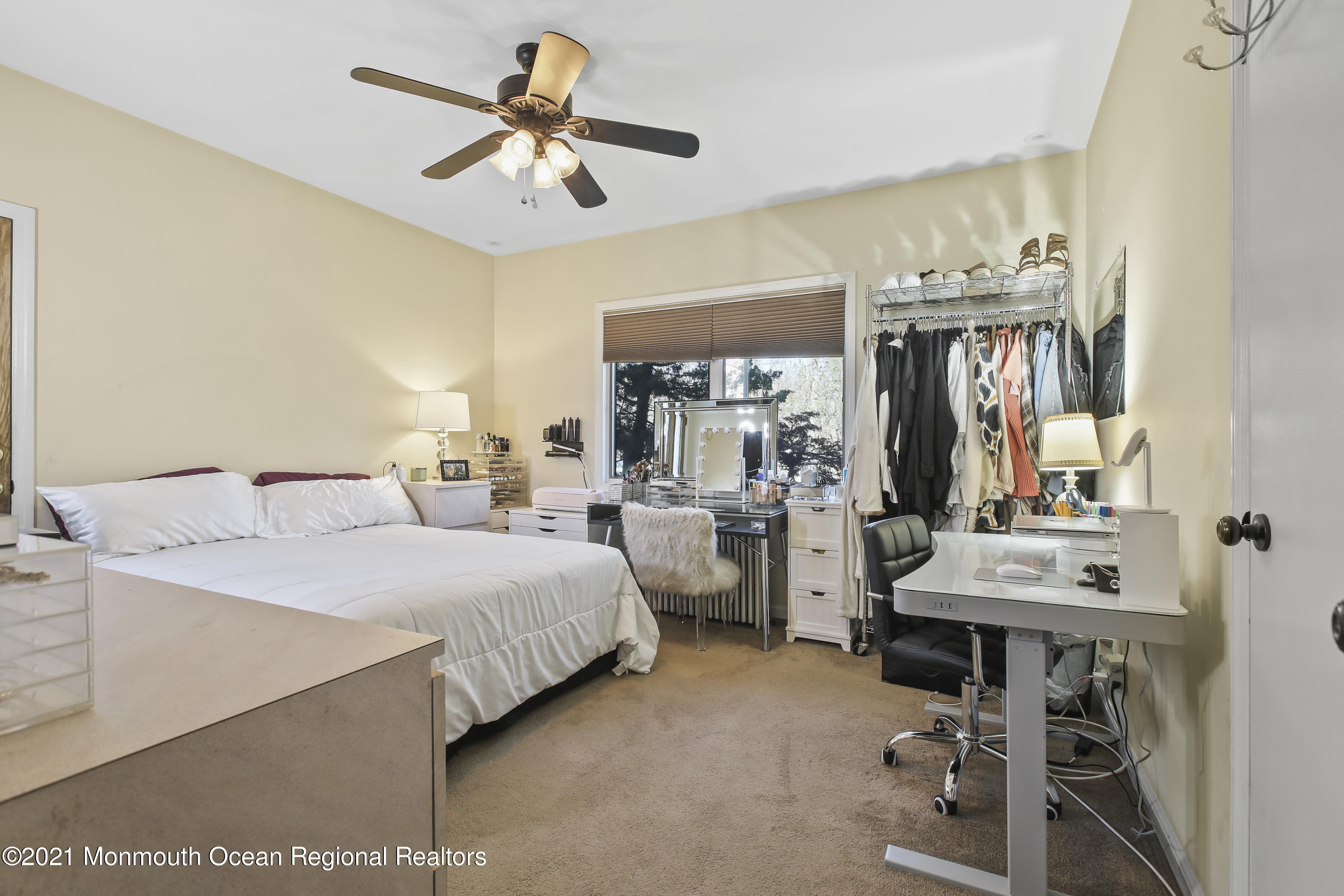 450 North County Line Road Jackson, NJ 08527 - Photo 16 of 35 a bedroom with bed a mirror and furniture