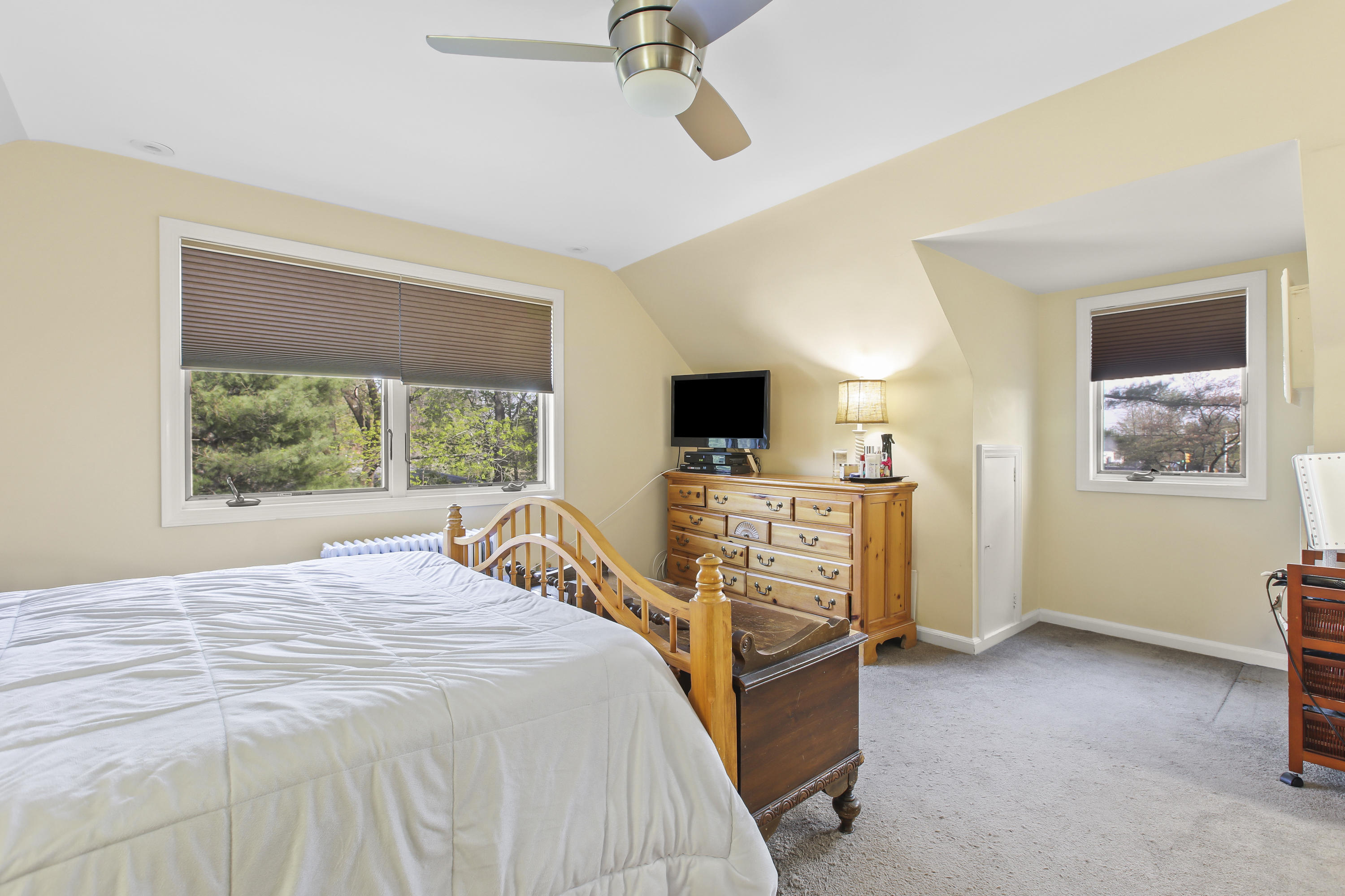 450 North County Line Road Jackson, NJ 08527 - Photo 22 of 35 a bedroom with a bed and a flat screen tv