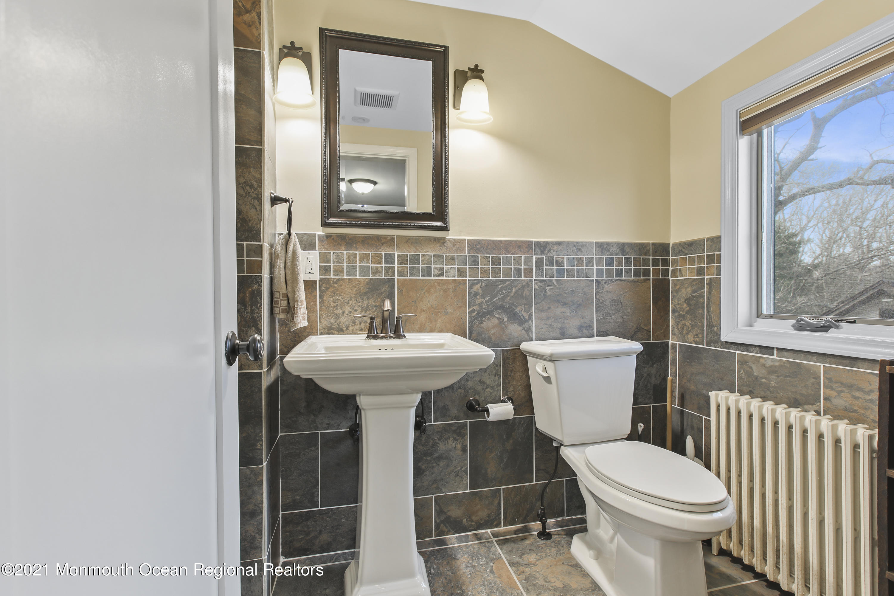 450 North County Line Road Jackson, NJ 08527 - Photo 24 of 35 a bathroom with a sink toilet and mirror