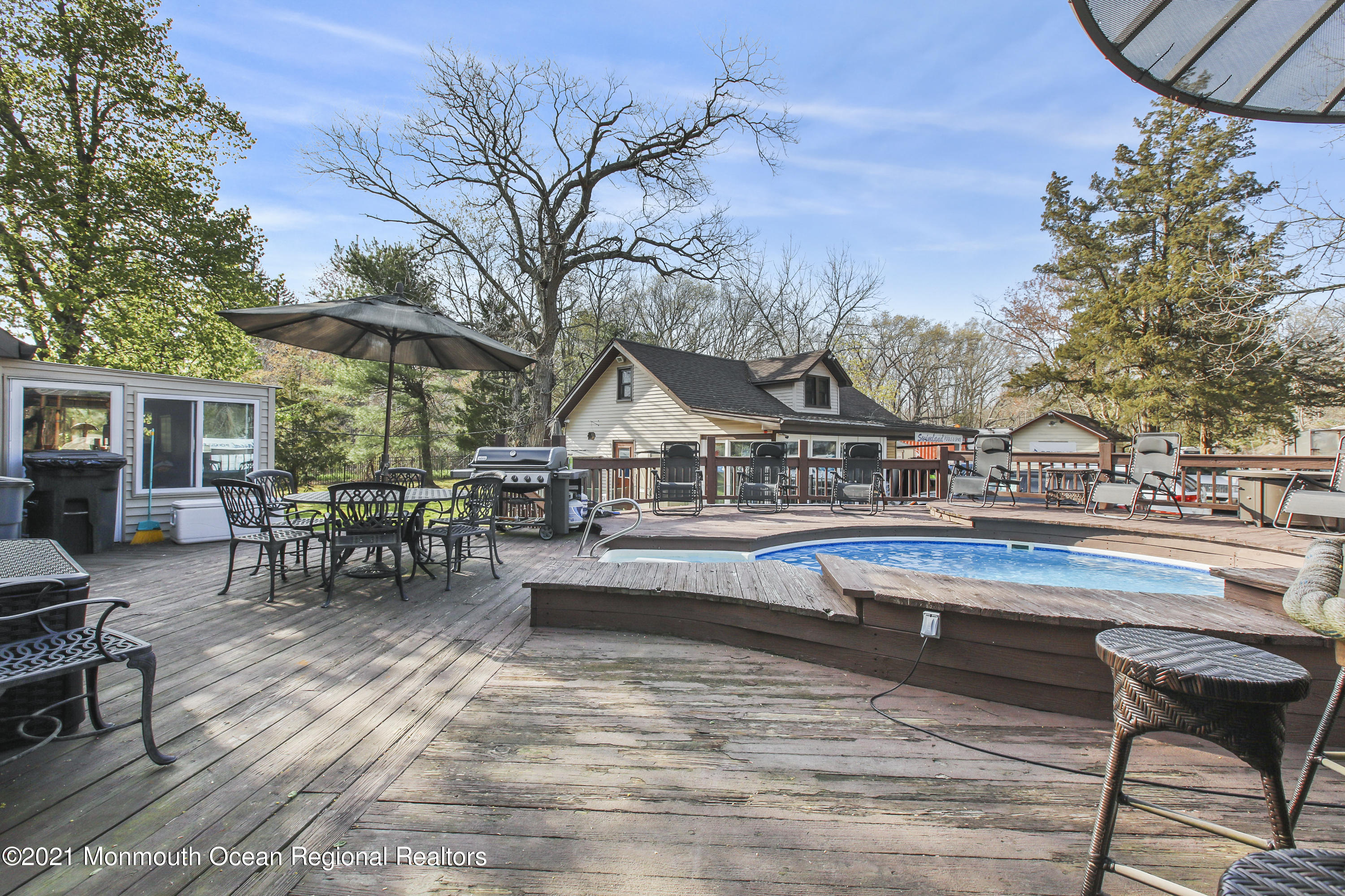 450 North County Line Road Jackson, NJ 08527 - Photo 28 of 35 a view of a swimming pool with chairs