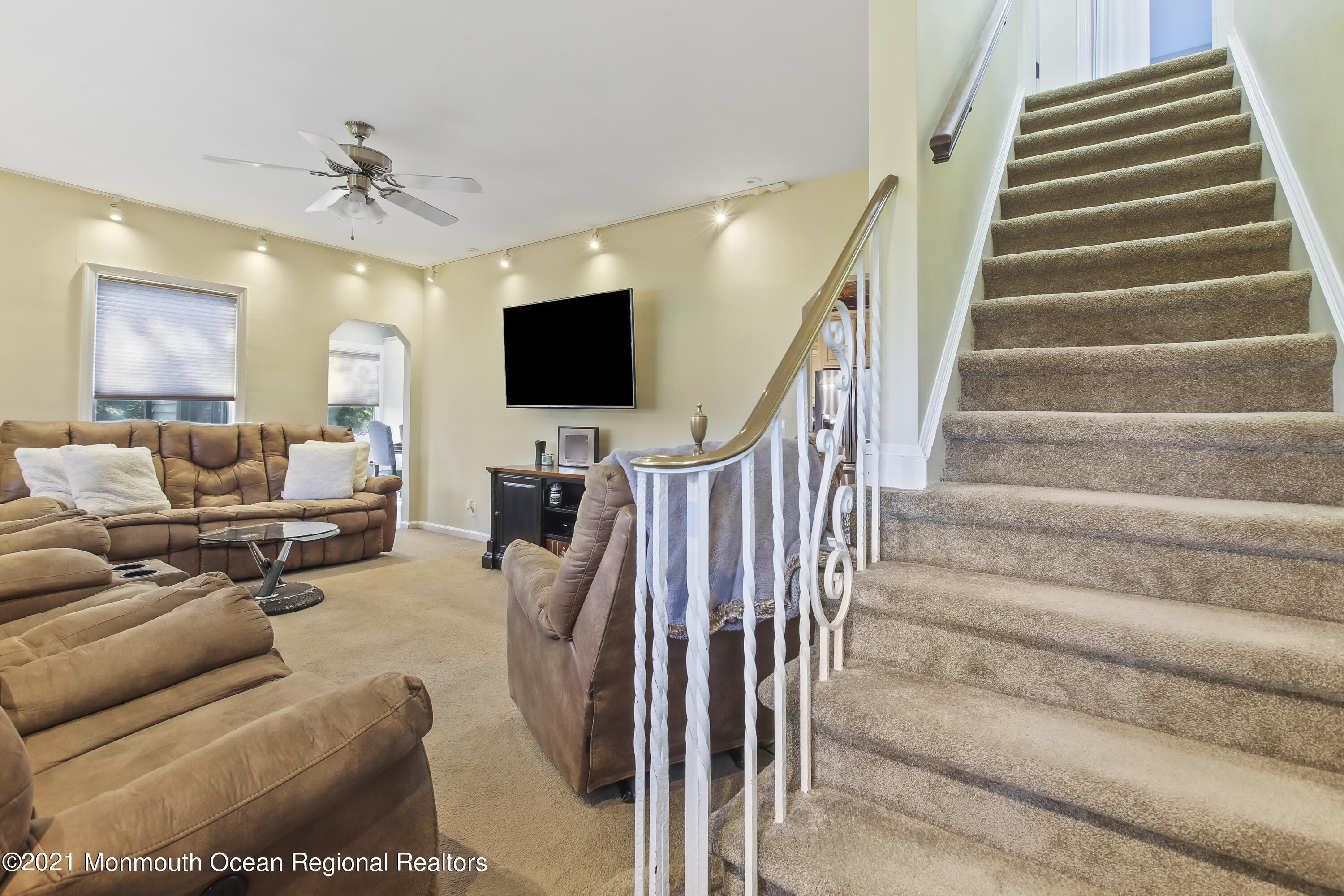 450 North County Line Road Jackson, NJ 08527 - Photo 7 of 35 a living room with furniture and a flat screen tv