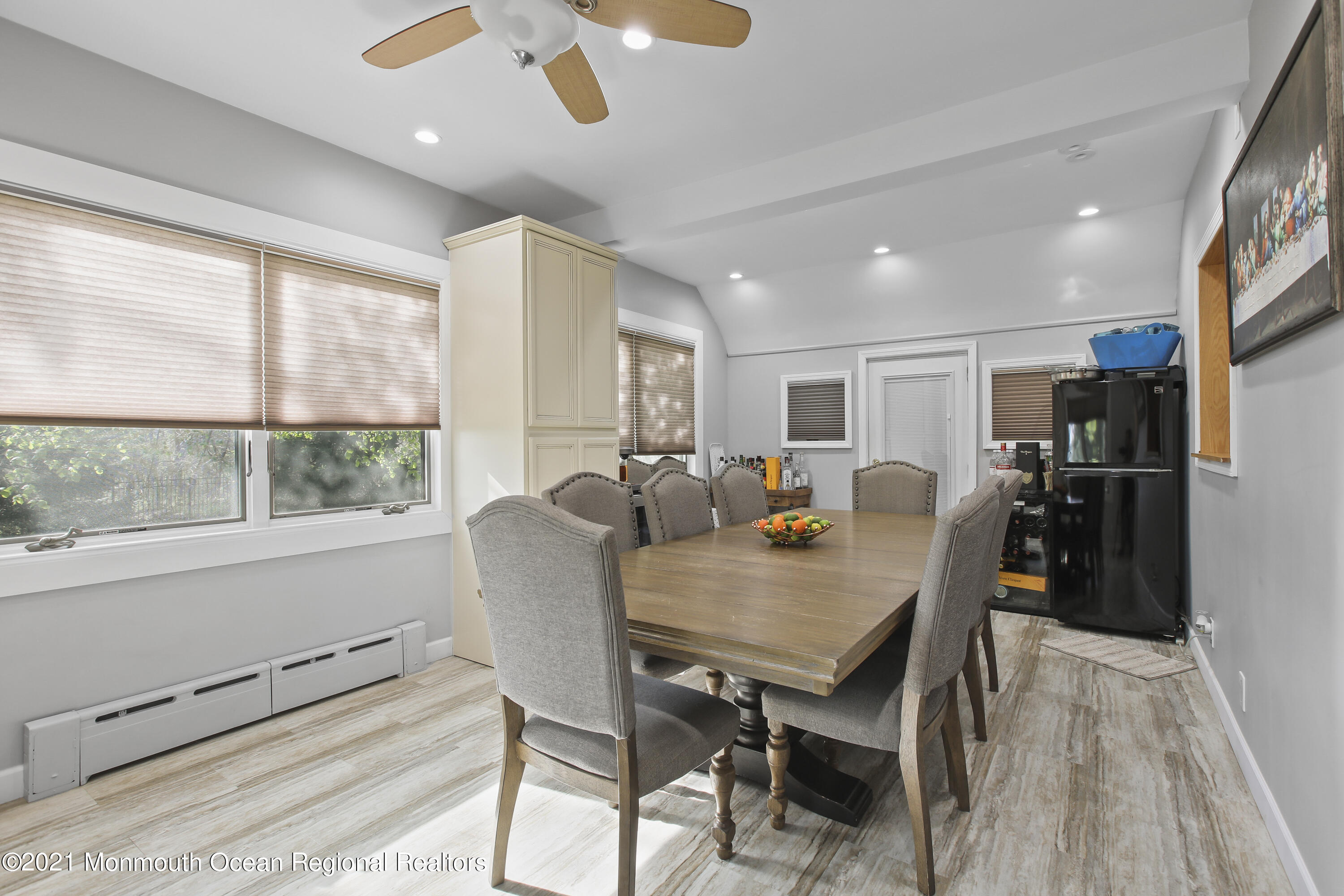 450 North County Line Road Jackson, NJ 08527 - Photo 10 of 35 a view of a dining room with furniture window and wooden floor