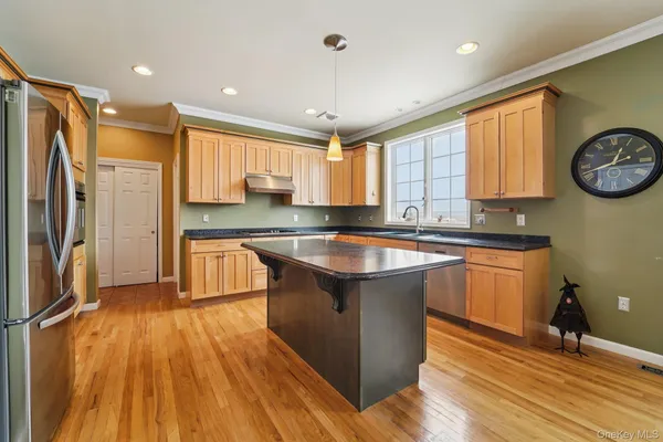 a bed room with two bed and a large window