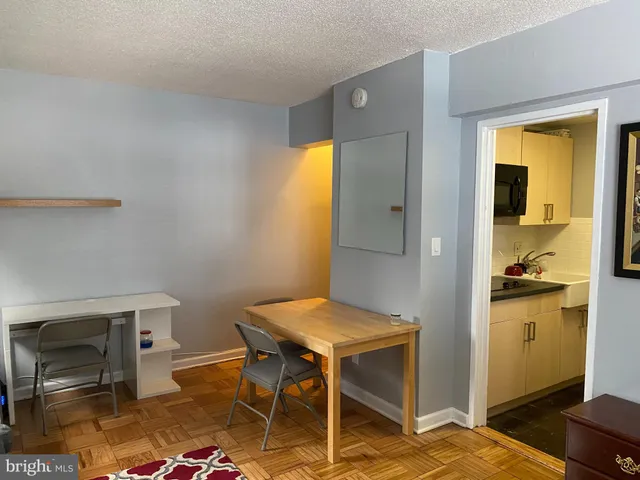 a workspace with furniture and window