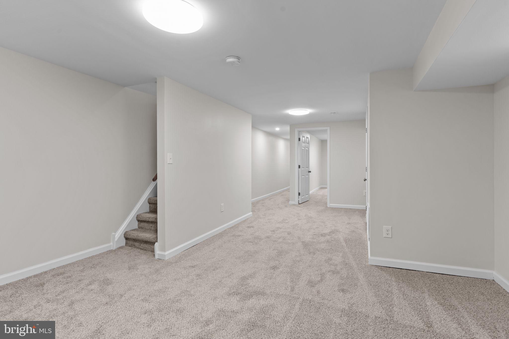 2142 North 58th Street Philadelphia, PA 19131 - Photo 24 of 36 an empty room with white walls and white door