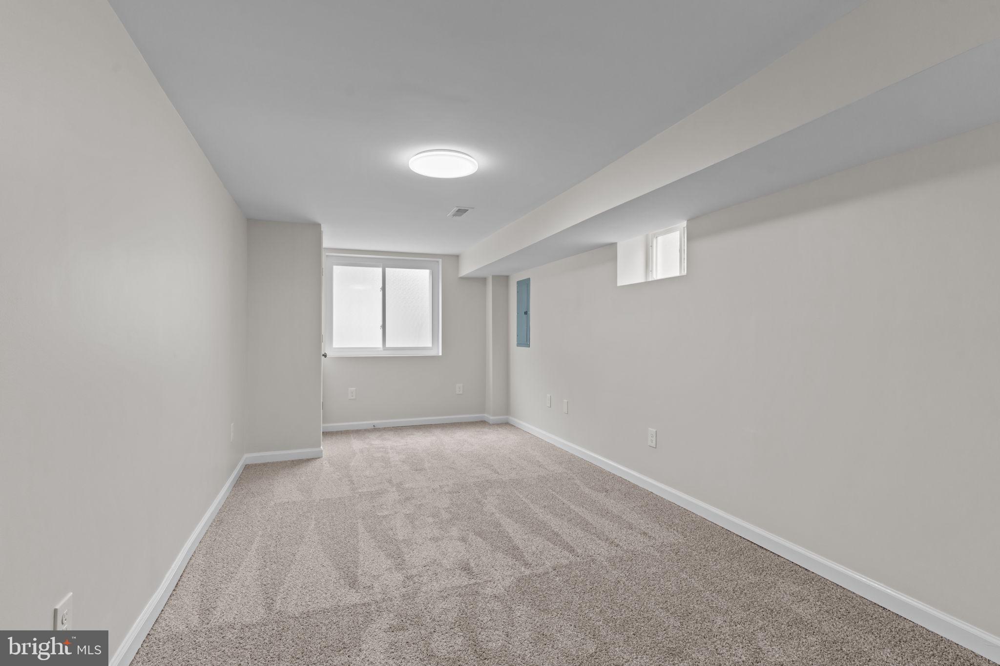 2142 North 58th Street Philadelphia, PA 19131 - Photo 26 of 36 an empty room with windows