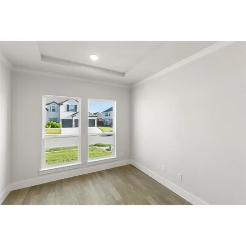 an empty room with windows