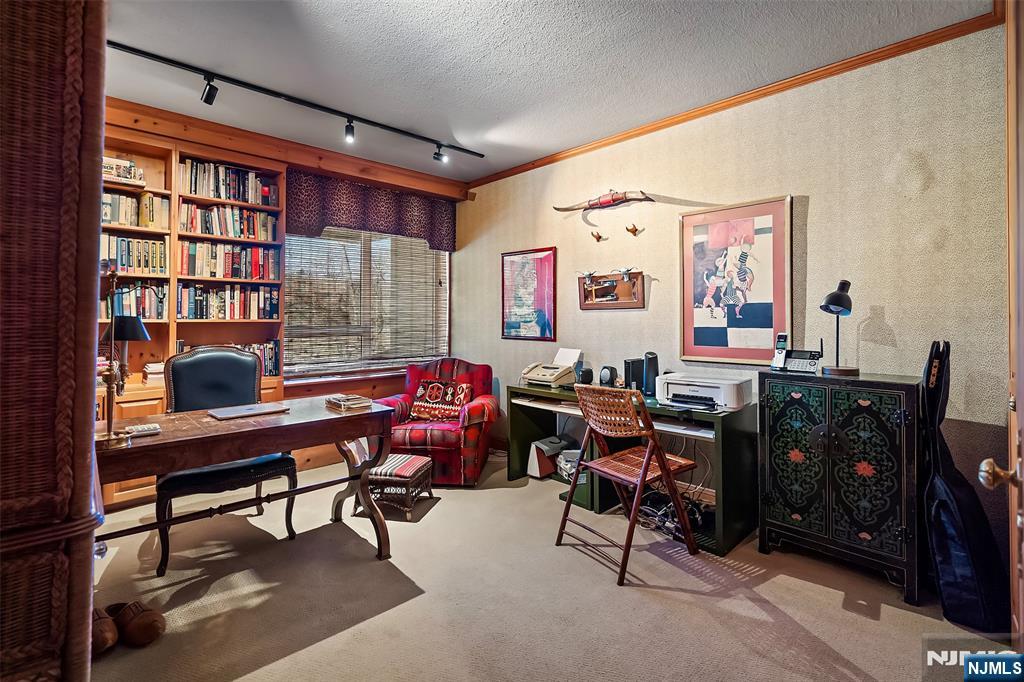 4 Horizon Road, Unit G10 Fort Lee, NJ 07024 - Photo 17 of 20 a view of a workspace with furniture and a window