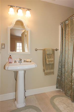 6 Preservation Way Medfield, MA 02052 - Photo 11 of 30 a bathroom with a sink a mirror and shower
