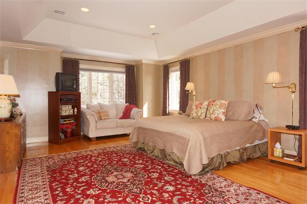 6 Preservation Way Medfield, MA 02052 - Photo 14 of 30 a bedroom with a bed and a couch