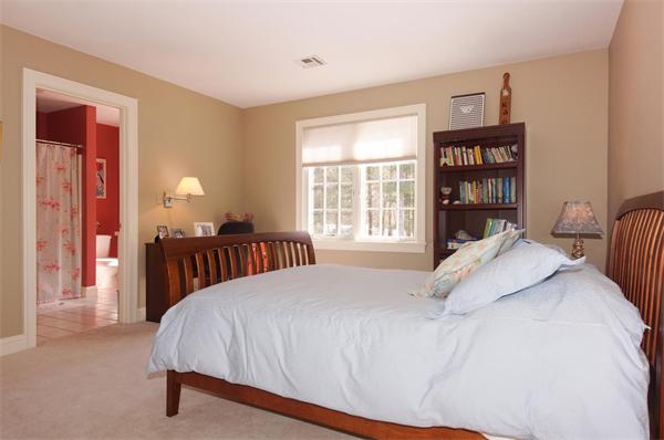 6 Preservation Way Medfield, MA 02052 - Photo 18 of 30 a bedroom with a bed a dresser and a large window