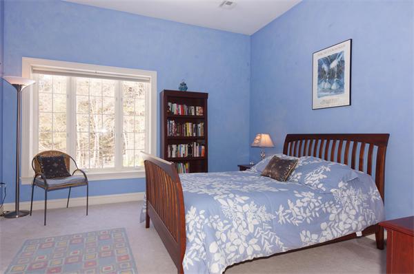 6 Preservation Way Medfield, MA 02052 - Photo 19 of 30 a bedroom with a bed and a chair