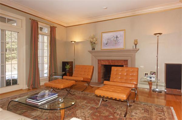 6 Preservation Way Medfield, MA 02052 - Photo 5 of 30 a living room with furniture a fireplace and a flat screen tv