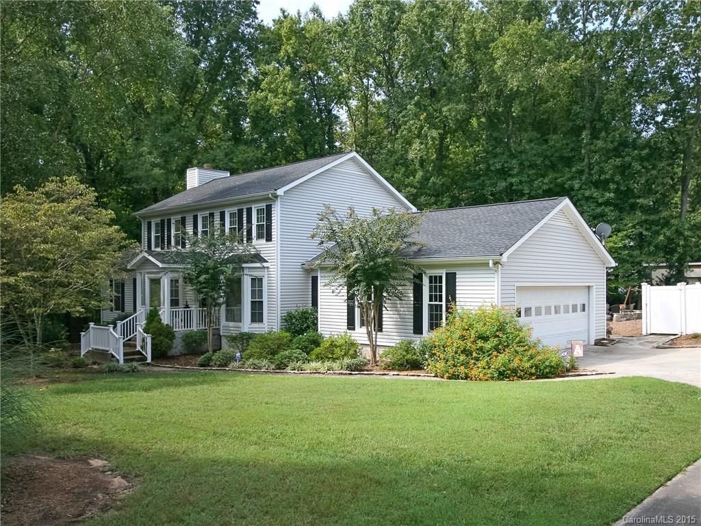 2819 Farmstead Lane Fort Mill, SC 29708 - Photo 1 of 24 a front view of house with yard and green space