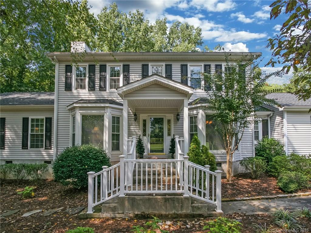 2819 Farmstead Lane Fort Mill, SC 29708 - Photo 2 of 24 a front view of a house with a garden