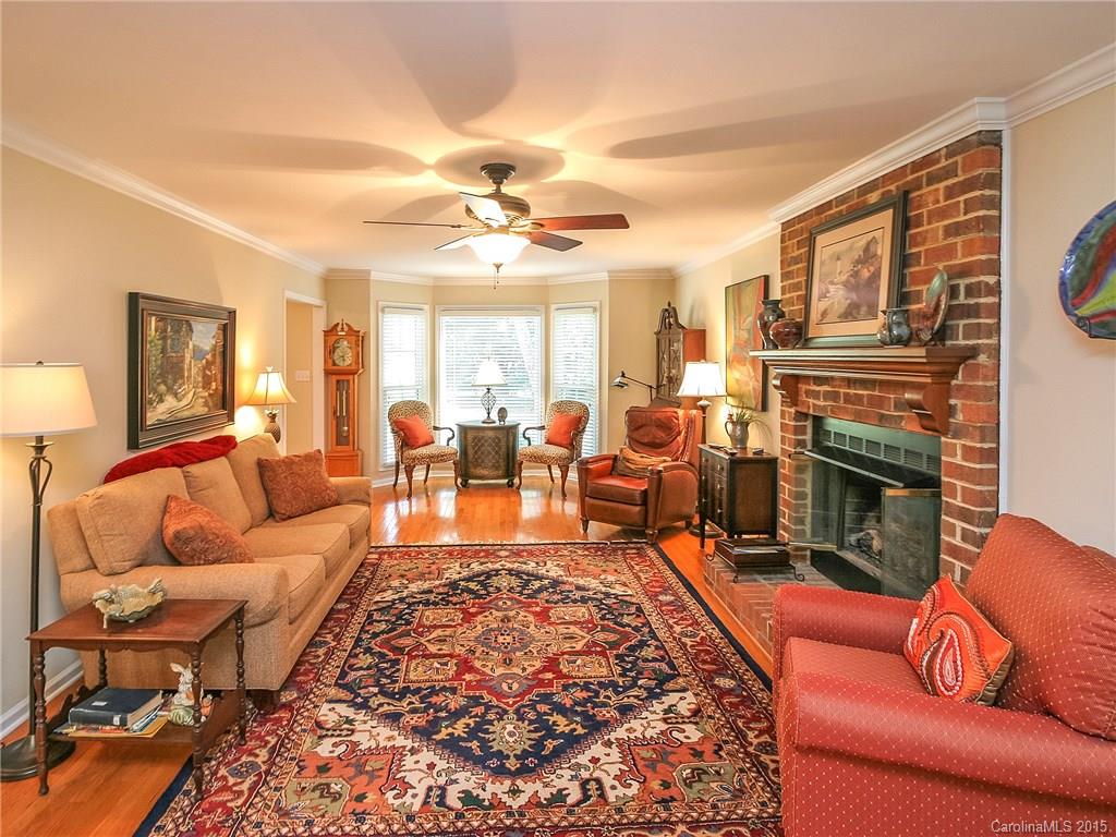 2819 Farmstead Lane Fort Mill, SC 29708 - Photo 11 of 24 a living room with furniture fireplace and a flat screen tv