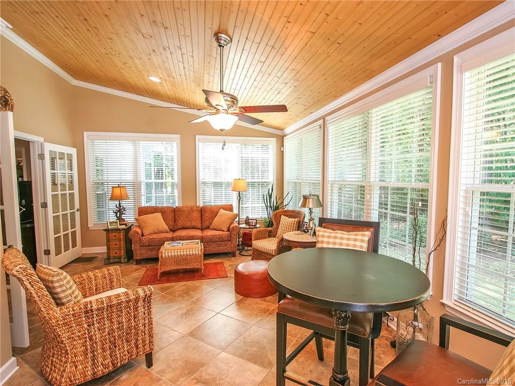 2819 Farmstead Lane Fort Mill, SC 29708 - Photo 14 of 24 a living room with furniture a table and chairs
