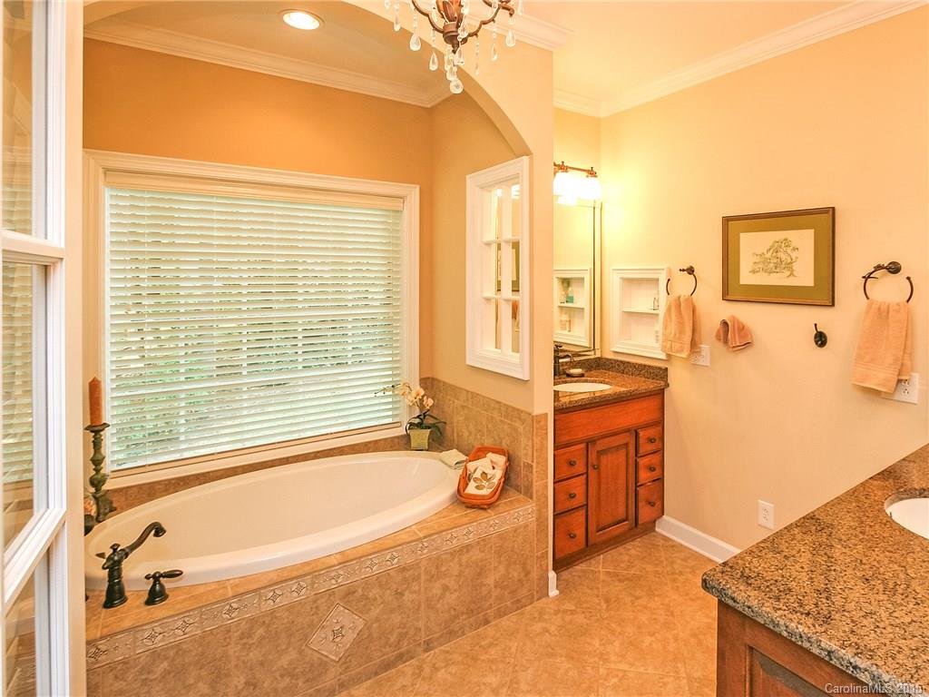 2819 Farmstead Lane Fort Mill, SC 29708 - Photo 16 of 24 a spacious bathroom with sink shower and bathtub