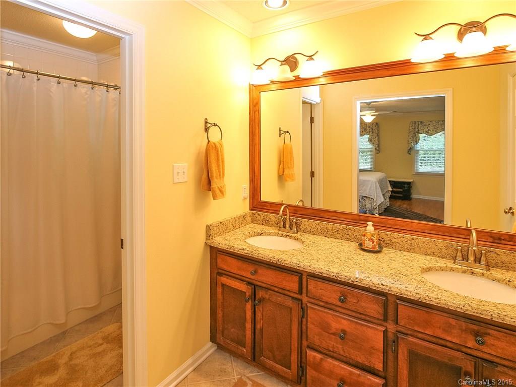2819 Farmstead Lane Fort Mill, SC 29708 - Photo 21 of 24 a bathroom with a double vanity sink and a mirror